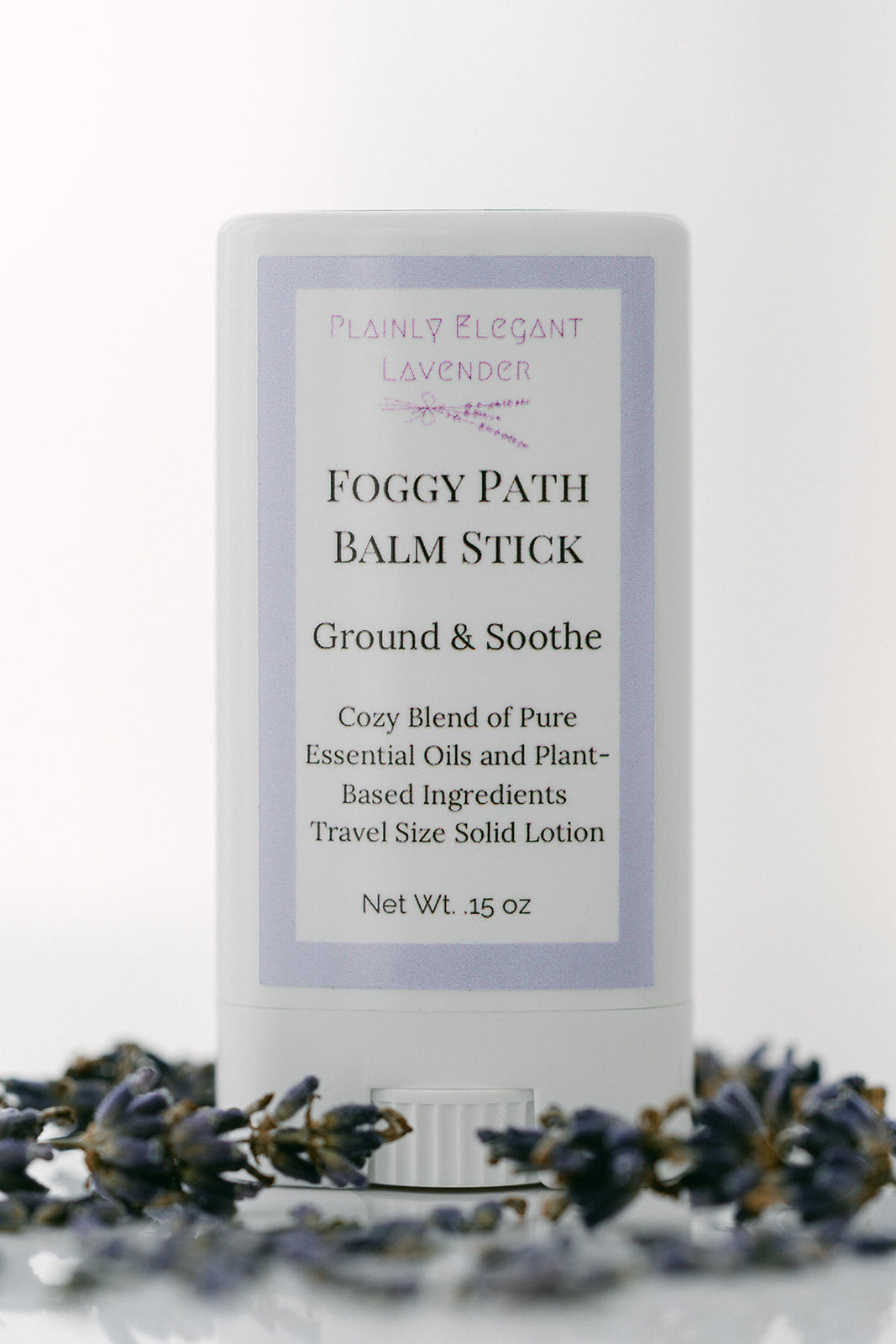 Foggy Path Solid Lotion Balm Stick with lavender flowers on a white background