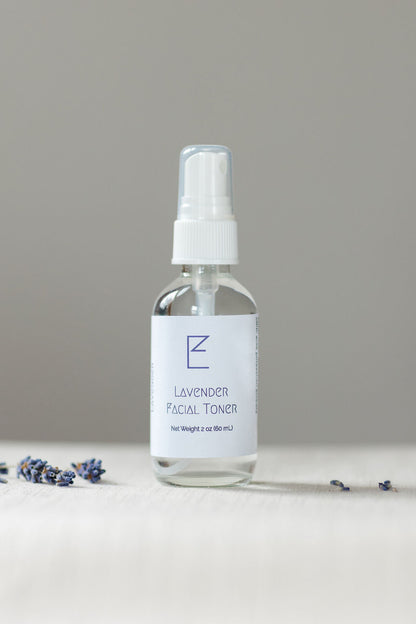 Small Lavender Facial Toner bottle. Clear bottle with white label and white spray top. 